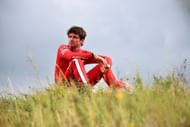 Charles Leclerc of Monaco and Scuderia Ferrari looks on from the dunes after crashing out of the race - Source: Getty Images